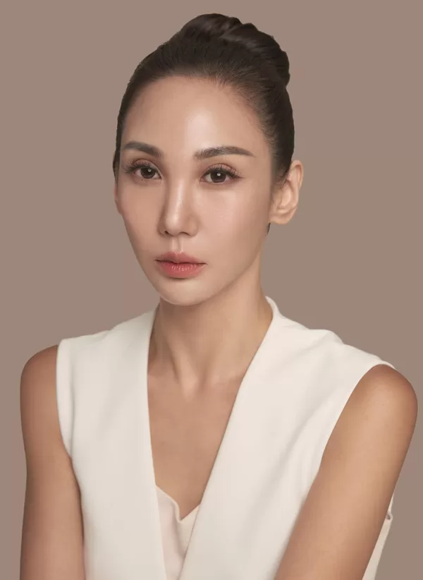 A professional portrait of Sarah Oh, BSN, RN - Founder of Youth Skin RX , a confident woman with 6+ years of aesthetic experience in the skincare industry.